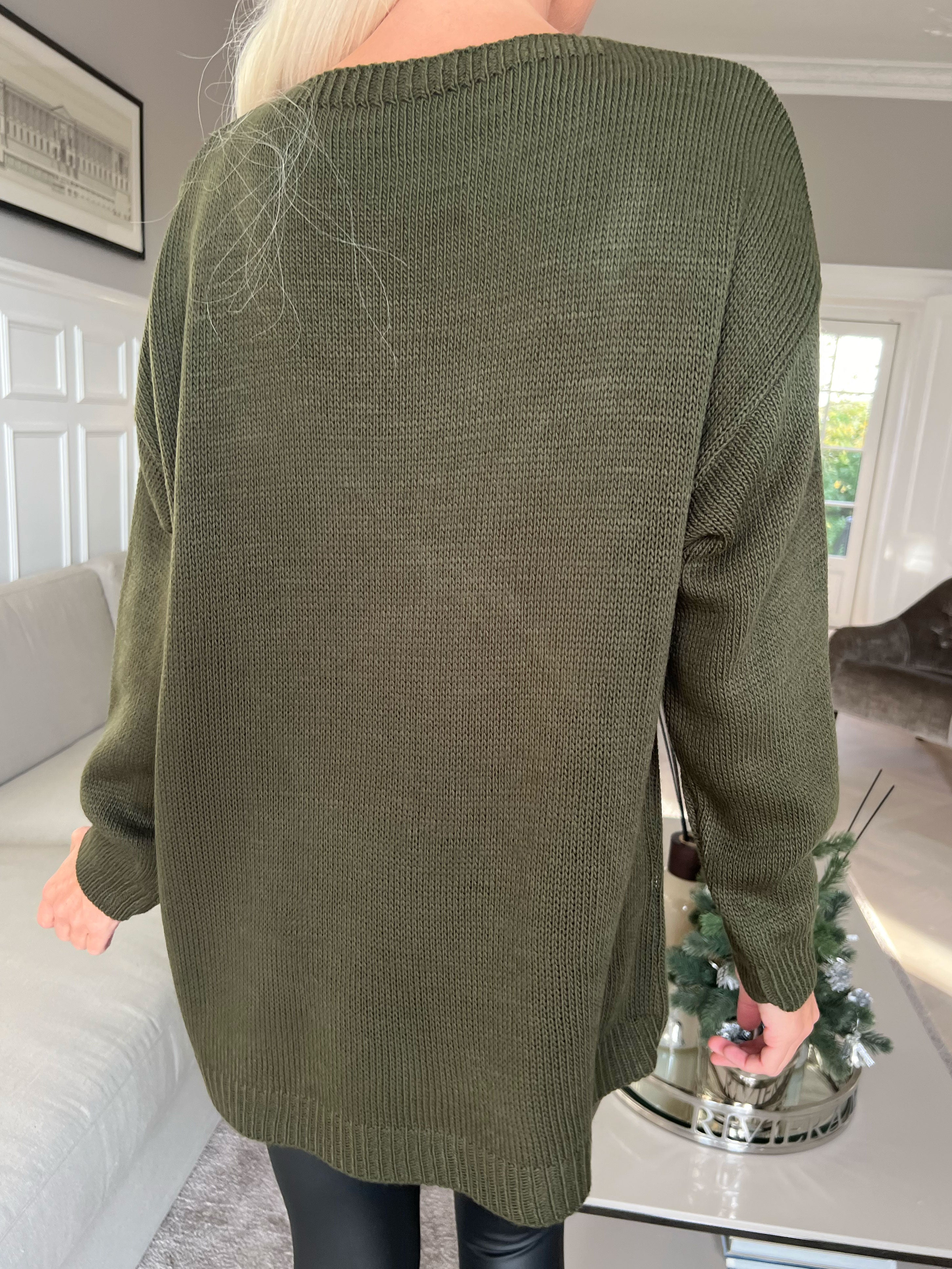 Mia - Strikbluse med firkløver på